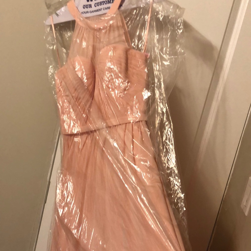A long pastel pink dress